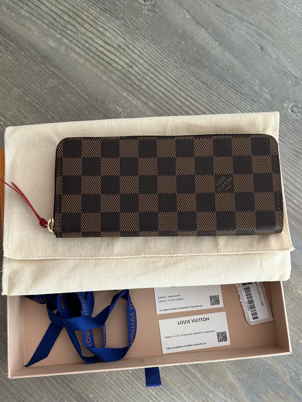 Authentic Louis Vuitton Damier Ebene Zip-Around Wallet with Red Leather Pull